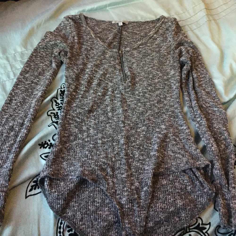 Grey body suit.